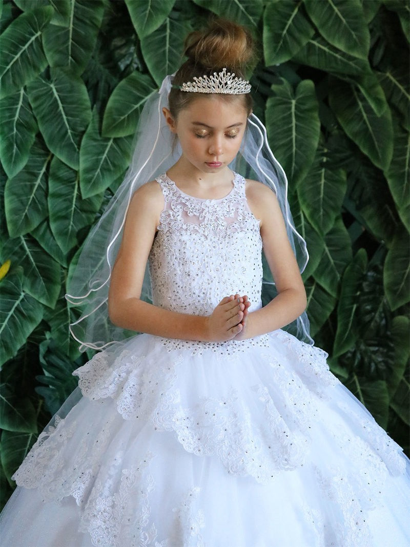 Asymmetrical botanical embroidery patterns and matte white seed beads detailing the front panel of the Calla Collection KY-224 bodice