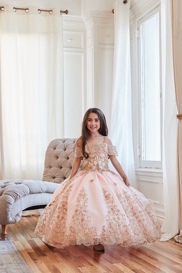 Calla Collection KY-230 big girls special occasion gown displaying a structured boat-neck illusion overlay top