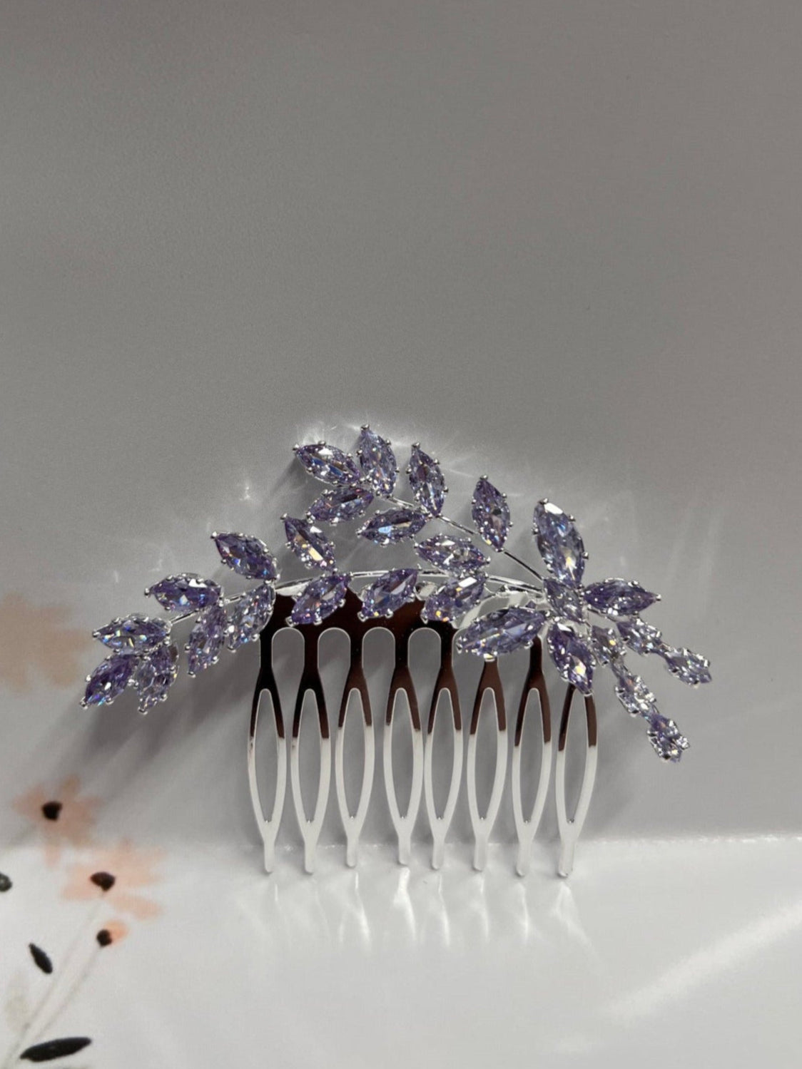 Calla Collection lilac jewelry piece, elegant design with intricate details, showcasing craftsmanship in a close-up view.