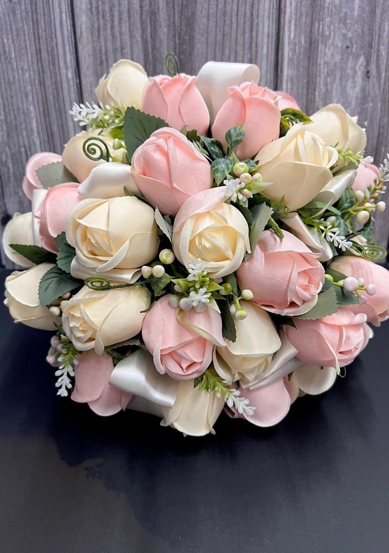 Beautifully structured round profile of the Calla Collection NATURAL FLOWER gown accessory holding full volume naturally.