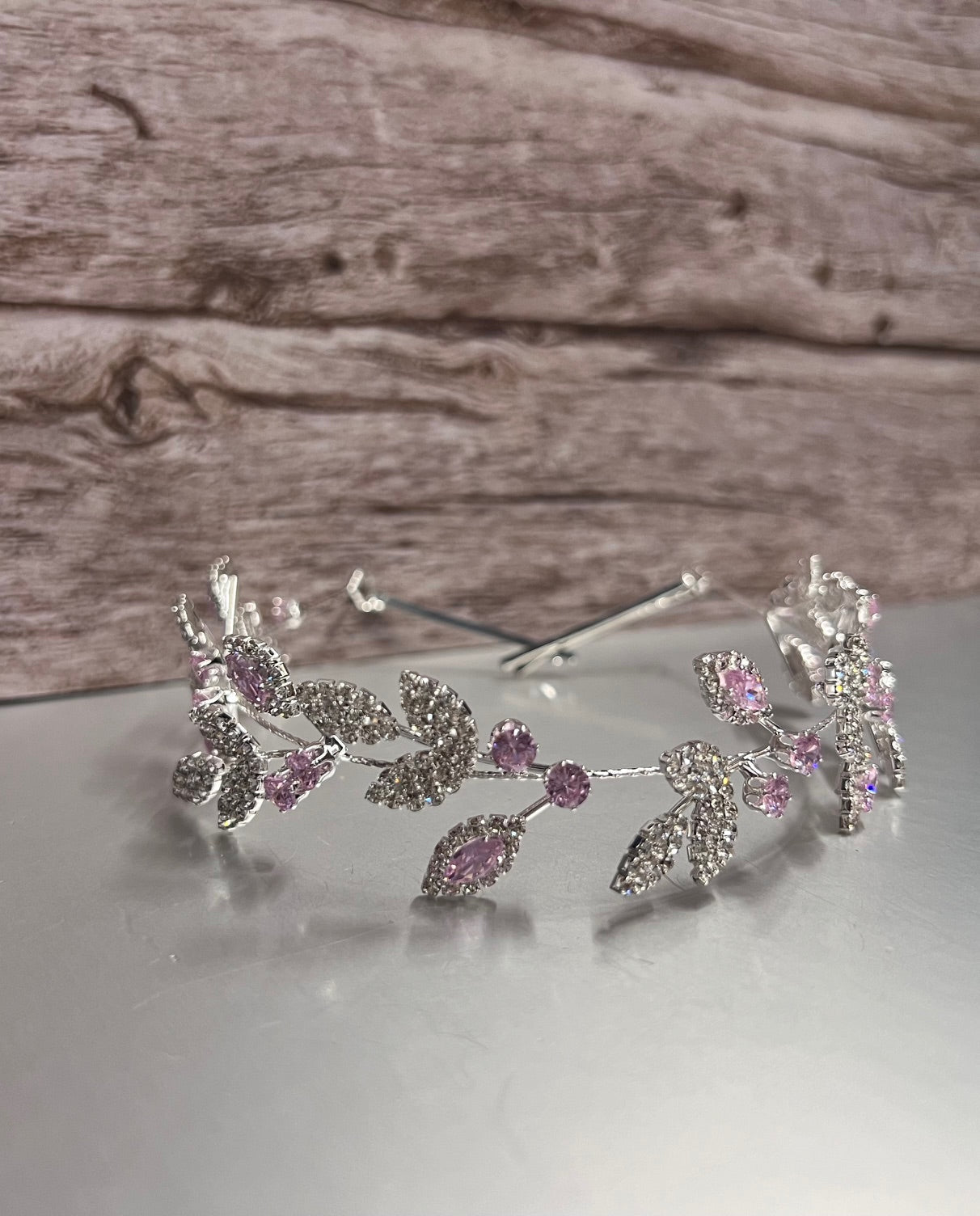 Calla Collection pink jewelry piece with intricate design, featuring delicate craftsmanship and vibrant pink color.