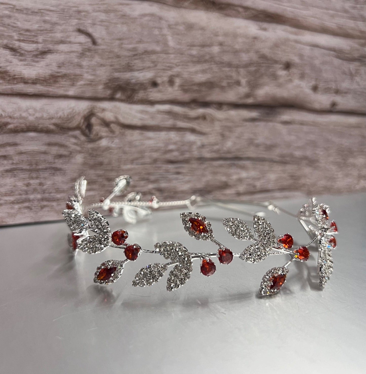 Red silver jewelry piece from Calla Collection, showcasing intricate design and polished finish in this elegant product image.