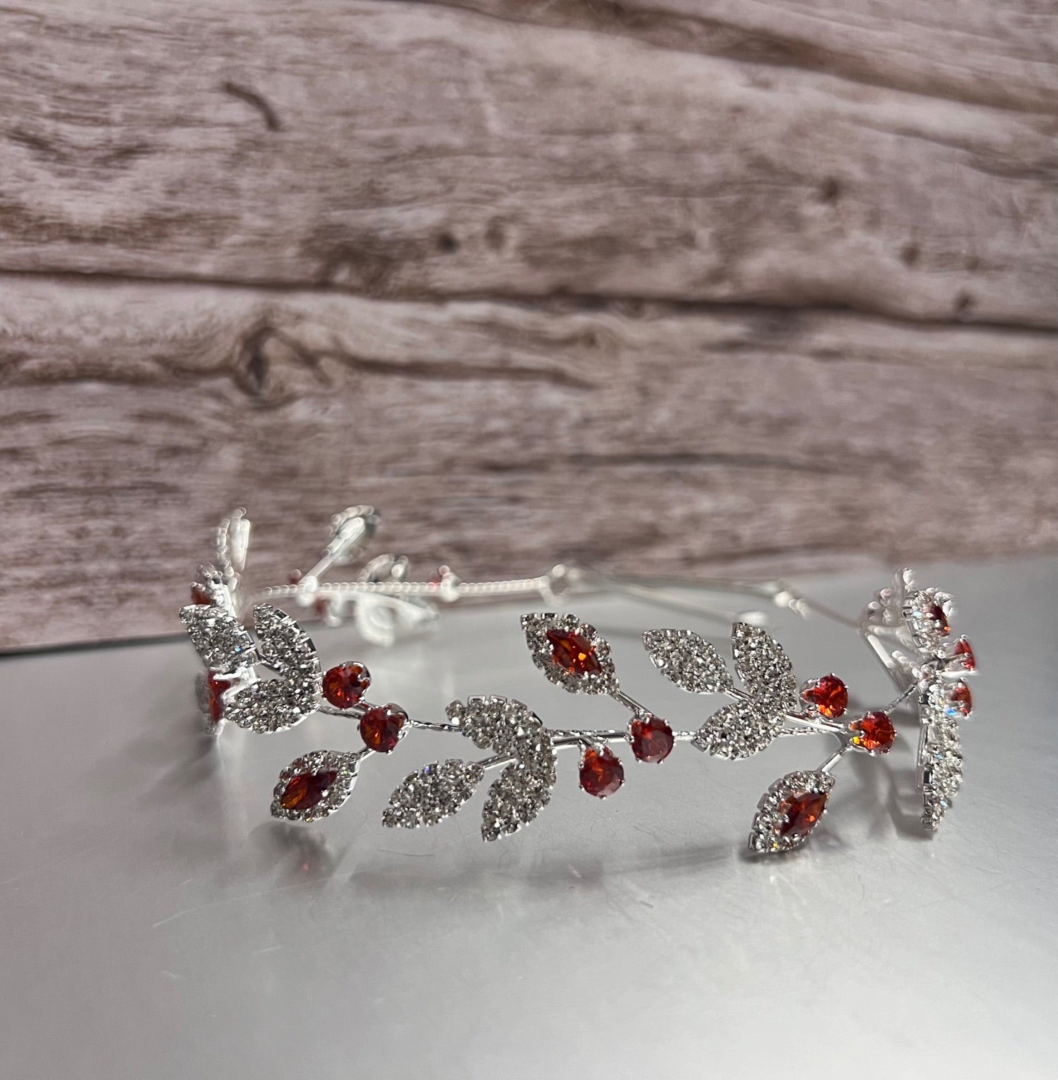 Red silver jewelry piece from Calla Collection, showcasing intricate design and polished finish in this elegant product image.