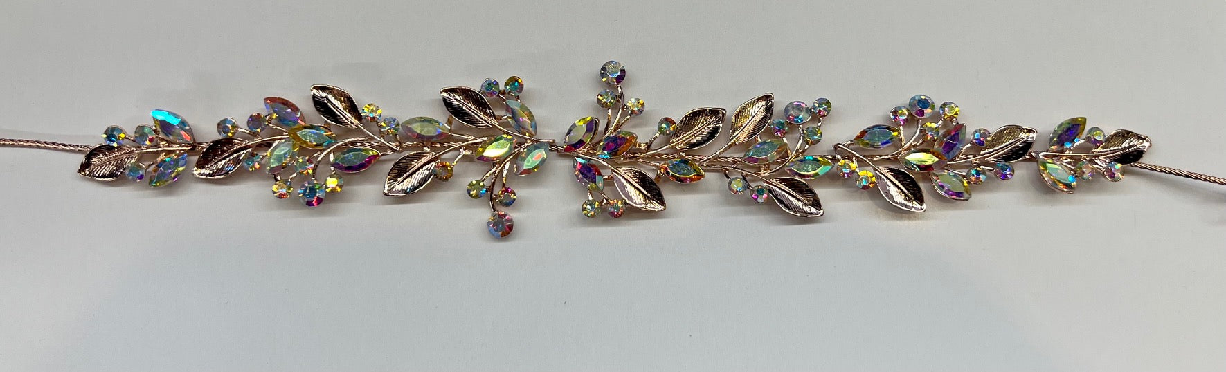 Rose gold Calla Collection TR-616 jewelry piece with intricate design, showcasing elegant craftsmanship and shiny finish.