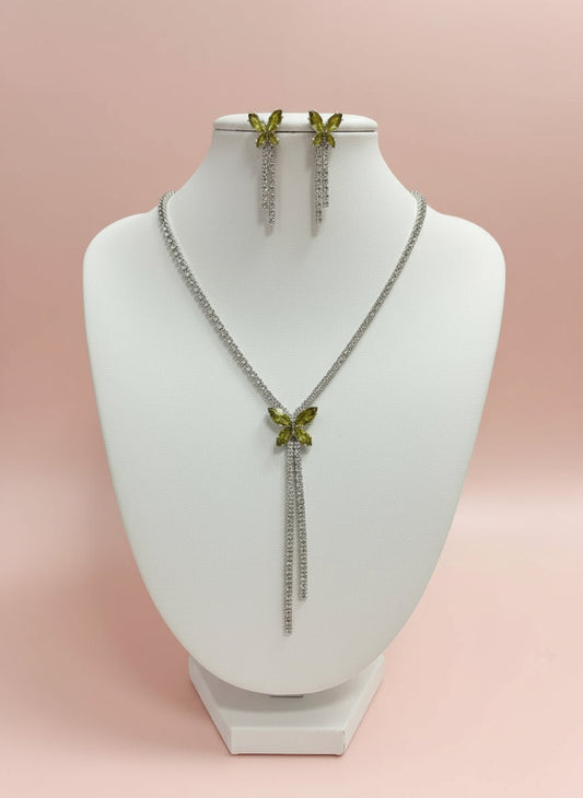 CALLAcollection necklace featuring a delicate chain with a sage green pendant, showcasing elegant jewelry design.