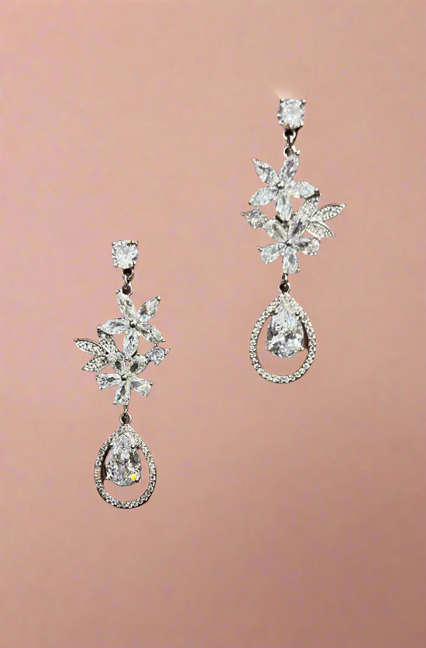 Silver earrings from Calla Collection, featuring a sleek, modern design with polished finish and elegant style.