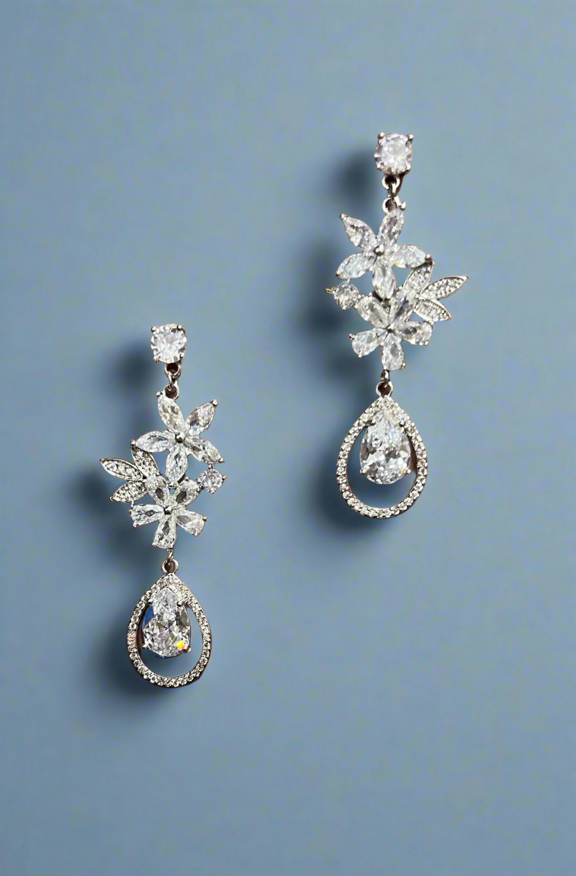 Silver Calla Collection earrings with elegant, intricate design, featuring polished finish and delicate craftsmanship.