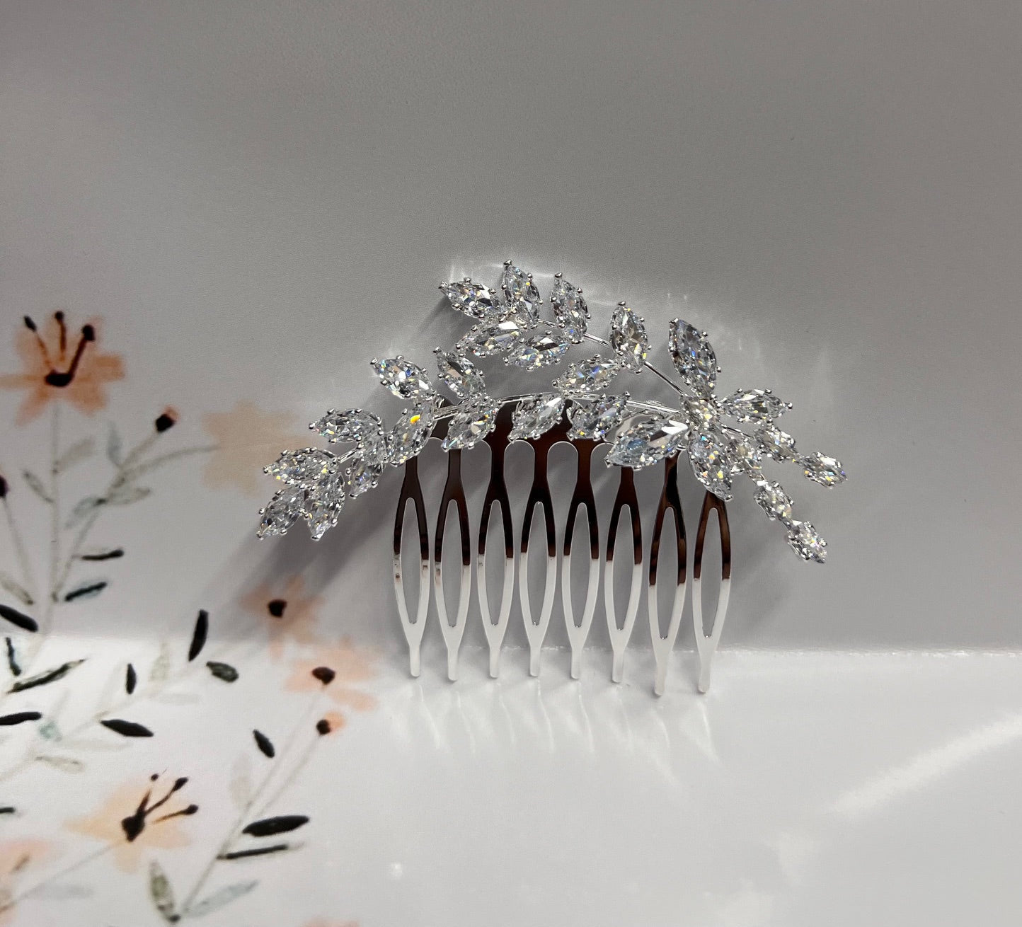 Calla Collection silver jewelry piece featuring intricate design, showcasing fine craftsmanship and elegant style.