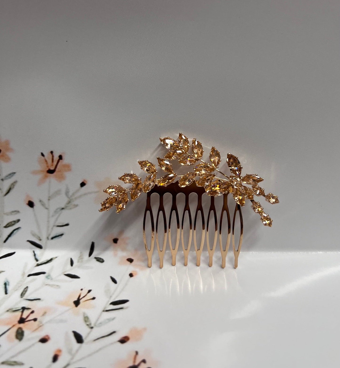 Calla Collection taupe jewelry piece, featuring elegant design and intricate details in natural taupe color.