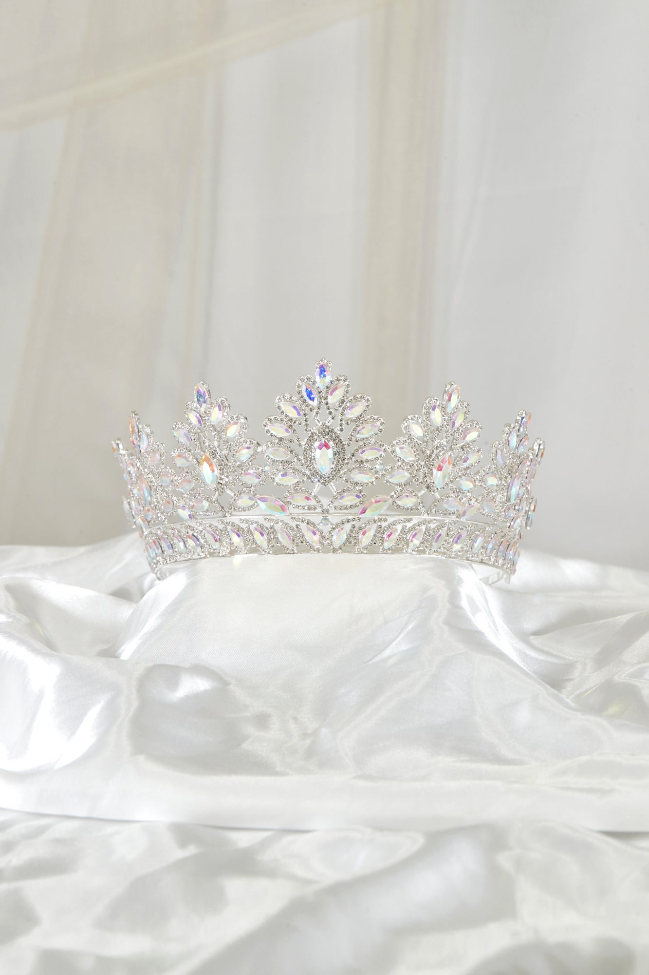 Calla Collection TR-937 jewelry tiara with intricate design and sparkling details, shown from a side view.