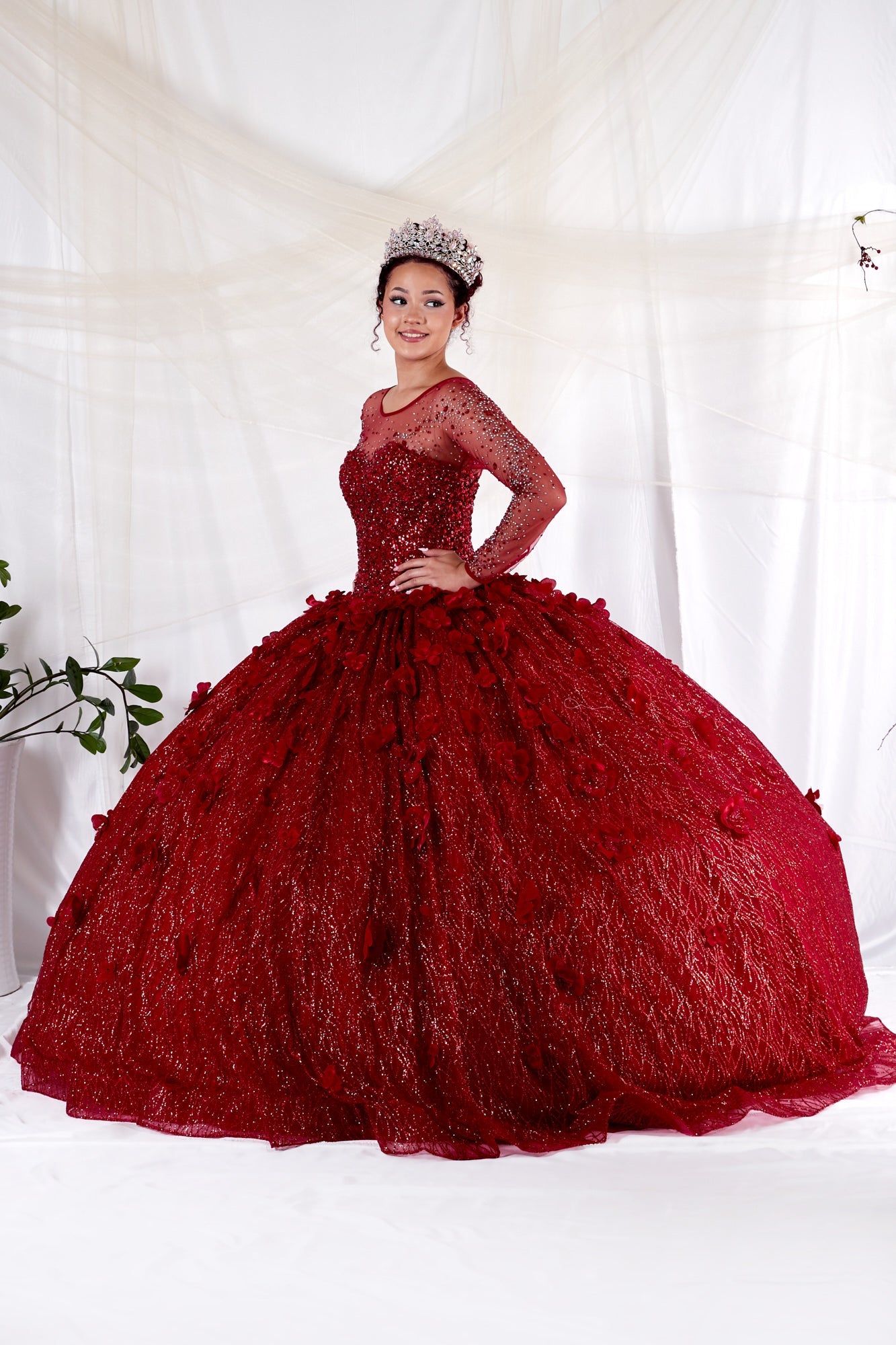 Calla Collection KY-82256 special occasion ball gown presenting a dramatic illusion sweetheart neckline and delicate sheer long sleeves