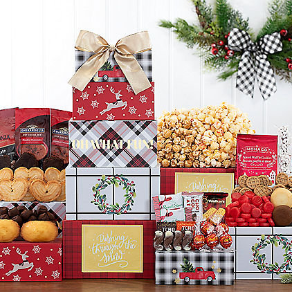 Holiday sweets gift basket by GreatArrivals featuring assorted treats in a decorative tower for festive occasions.
