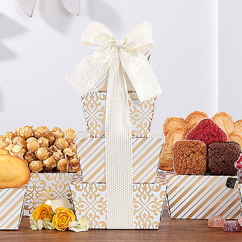 Gourmet gift basket from GreatArrivals/WineCountry featuring sweet treats and delicacies in a decorative tower arrangement.