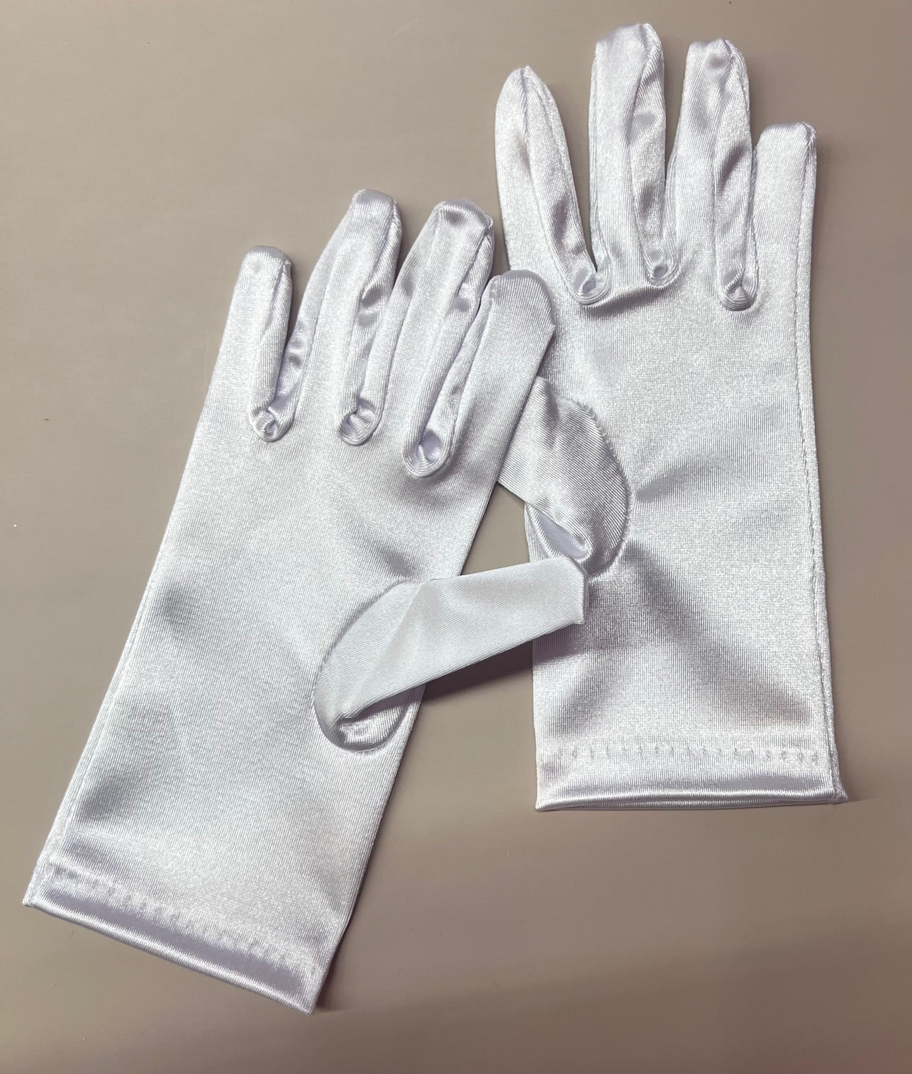 White kids gloves from Calla Collection GL-701, soft fabric with a snug fit, perfect for cold weather and outdoor activities.