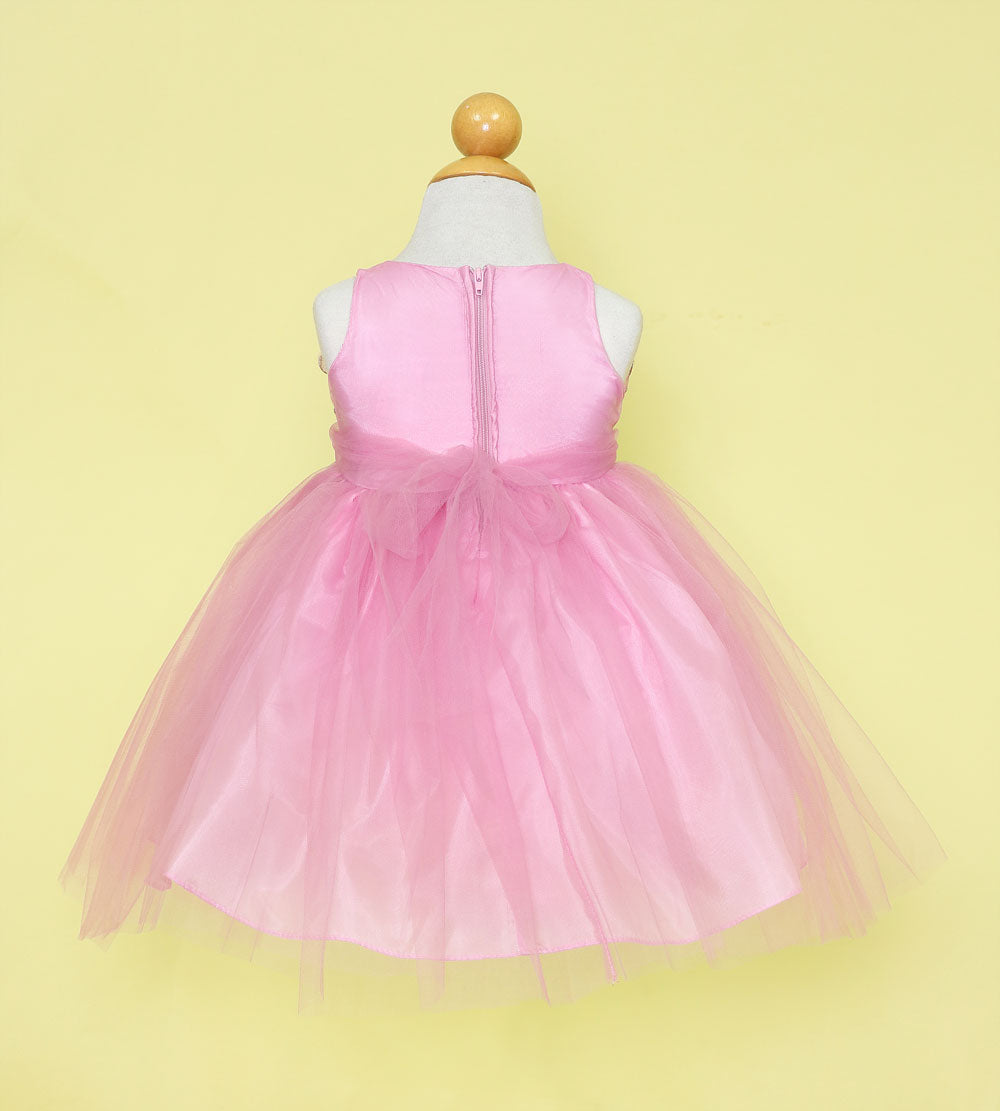 Back view of Calla Collection baby girls dusty pink and gold lace ceremony dress.